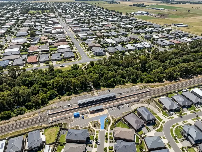 Illustration of houses and a station in the City of Melton